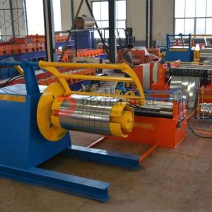 Coiled steel being slit into multiple narrower strips