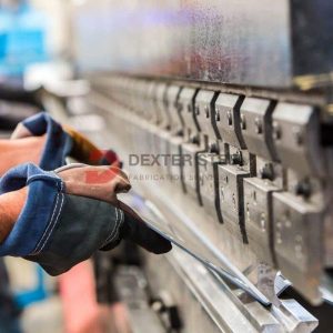 Press brake bending a large sheet of metal into a V-shape