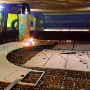 Precision laser cutting of a steel plate at Dexter Steel