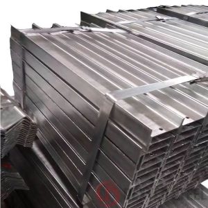 Alloy steel beams with specific chemistry for enhanced performance