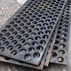 Perforated steel plate with custom made uniform round holes pattern