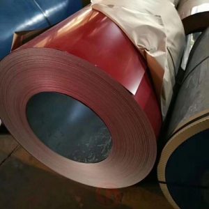 Colorful PPGI coils in red, blue, green stacked in warehouse