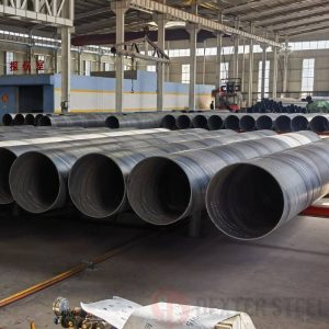Spiral welded steel pipes showing characteristic helical weld pattern