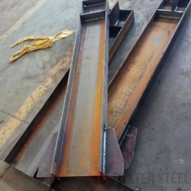 Custom welded steel beam with visible weld seams, fabricated section